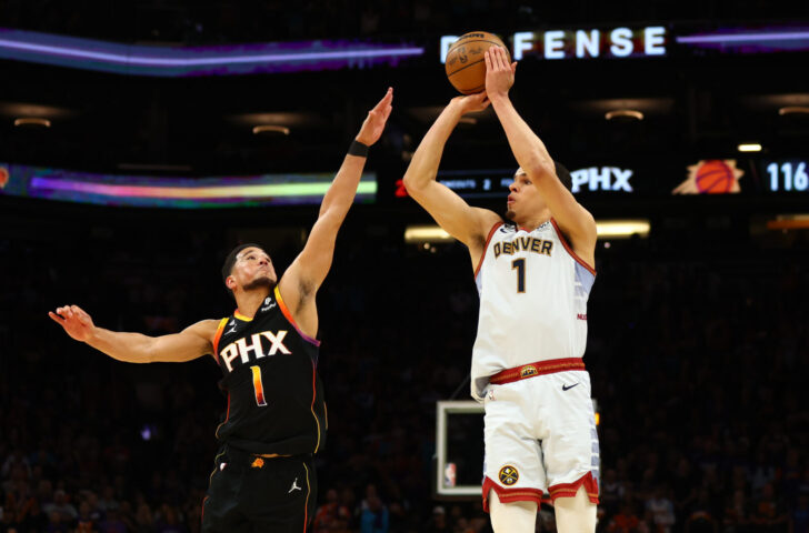 Michael Porter Jr. #1 of the Denver Nuggets dribbles during the game